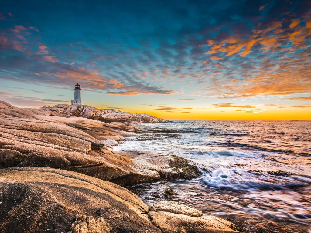 Peggy's cove lighthouse sunset ocean view landscape in Halifax, Nova Scotia