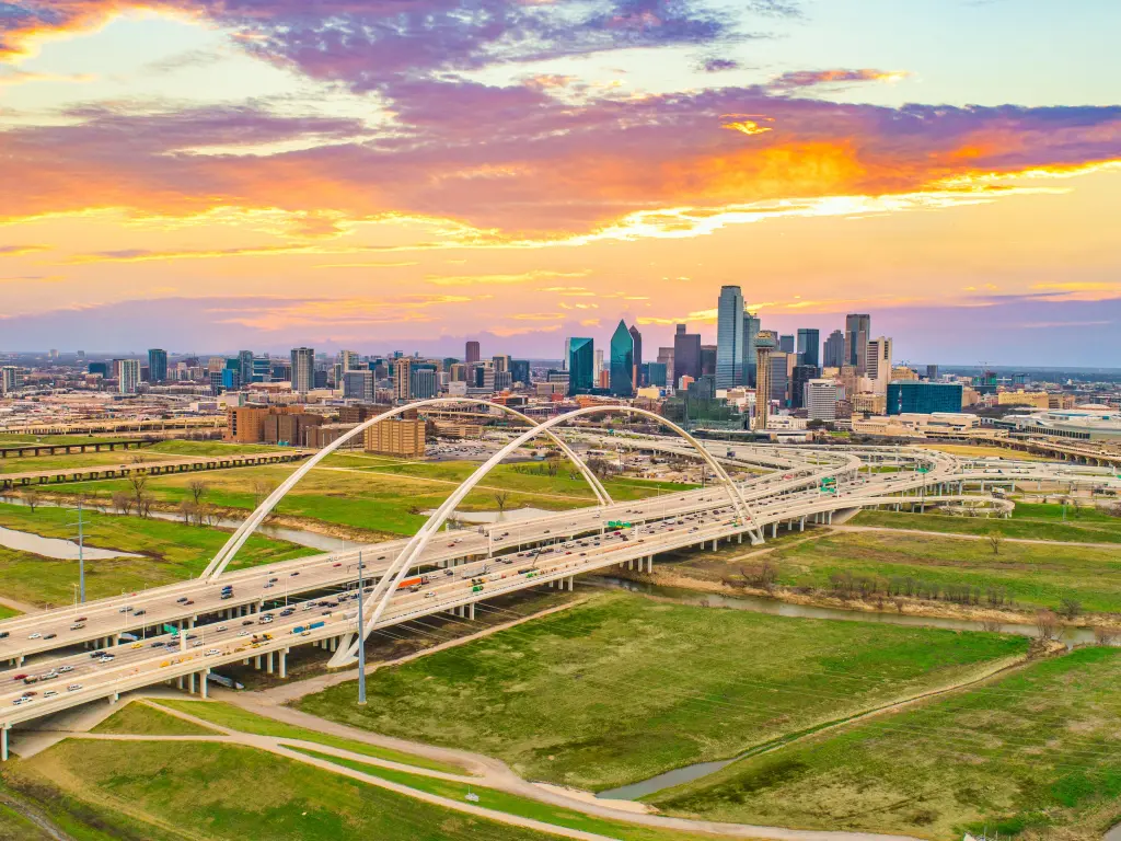 Panoramic view of the sun setting across downtown Dallas, Texas, USA 