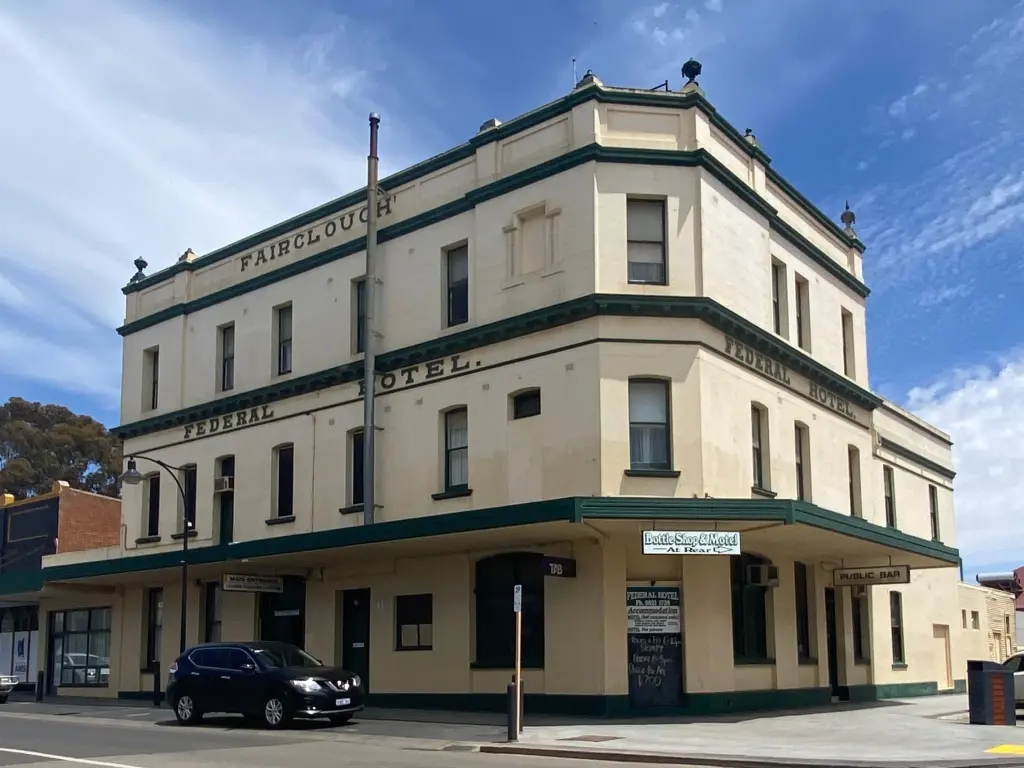 Historic building in a small town, partially cloudy day