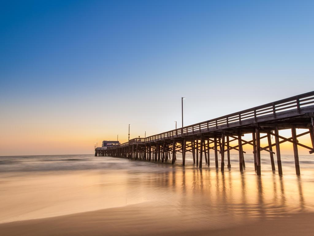 Newport Beach, California, USA with a view of Balboa pier at sunset.