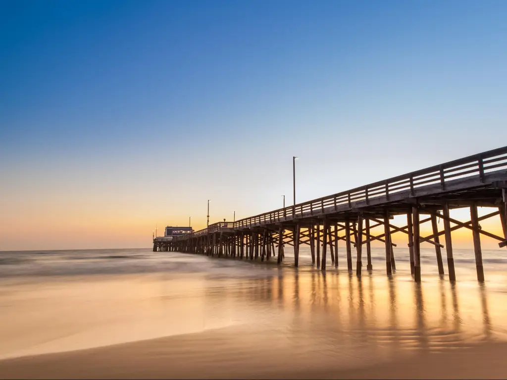 Newport Beach, California, USA with a view of Balboa pier at sunset.