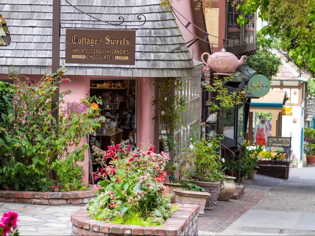 A quaint ivy-covered pink tea shop in Carmel-By-The-Sea, a city on the Pacific coast