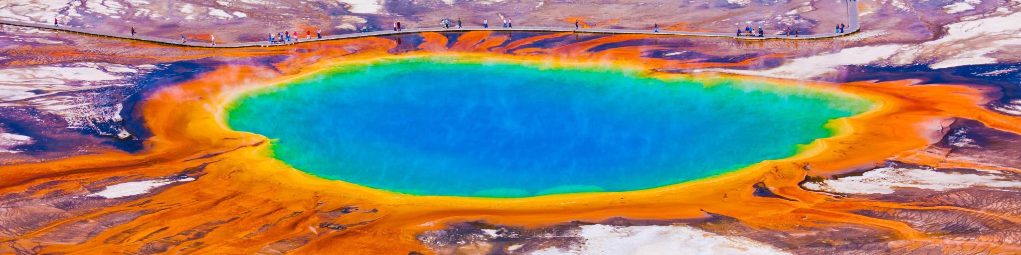 Beautiful aerial image of Grand Prismatic with people walking around it