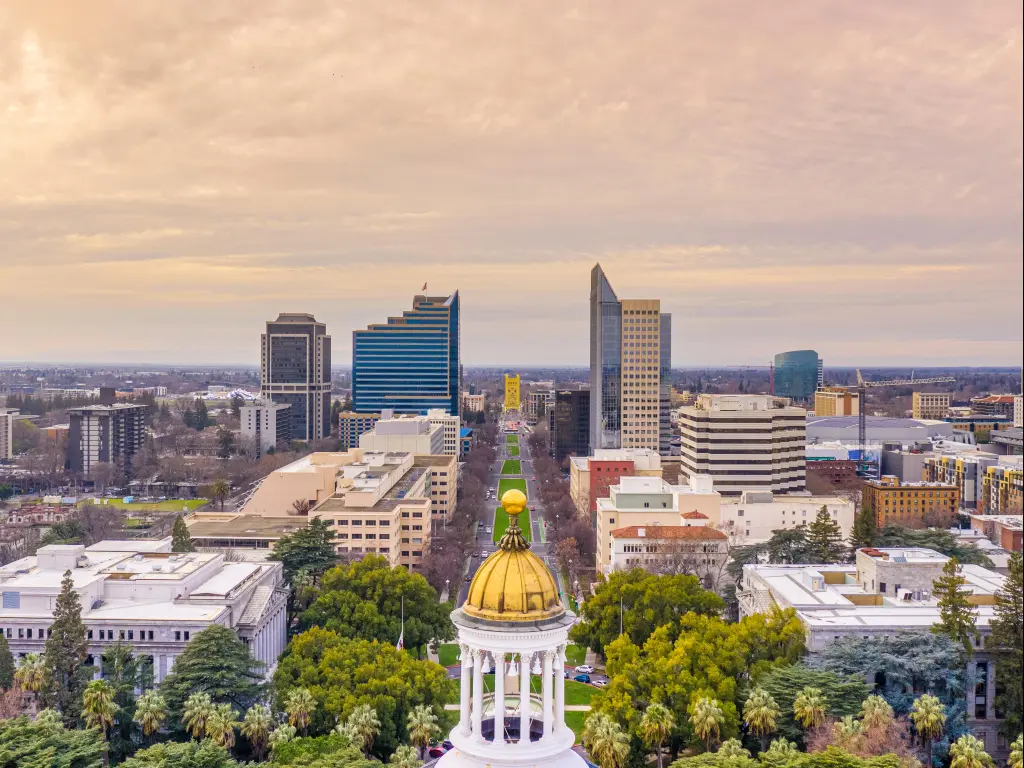 Sacramento, USA taken as an aerial photo with the downtown city running through to the distance and taken from the capital building at dusk.