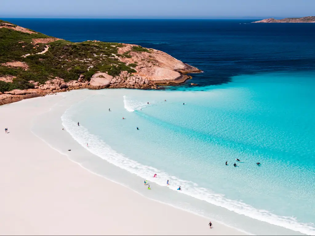 Aerial view of white sand bay with turquoise sea 