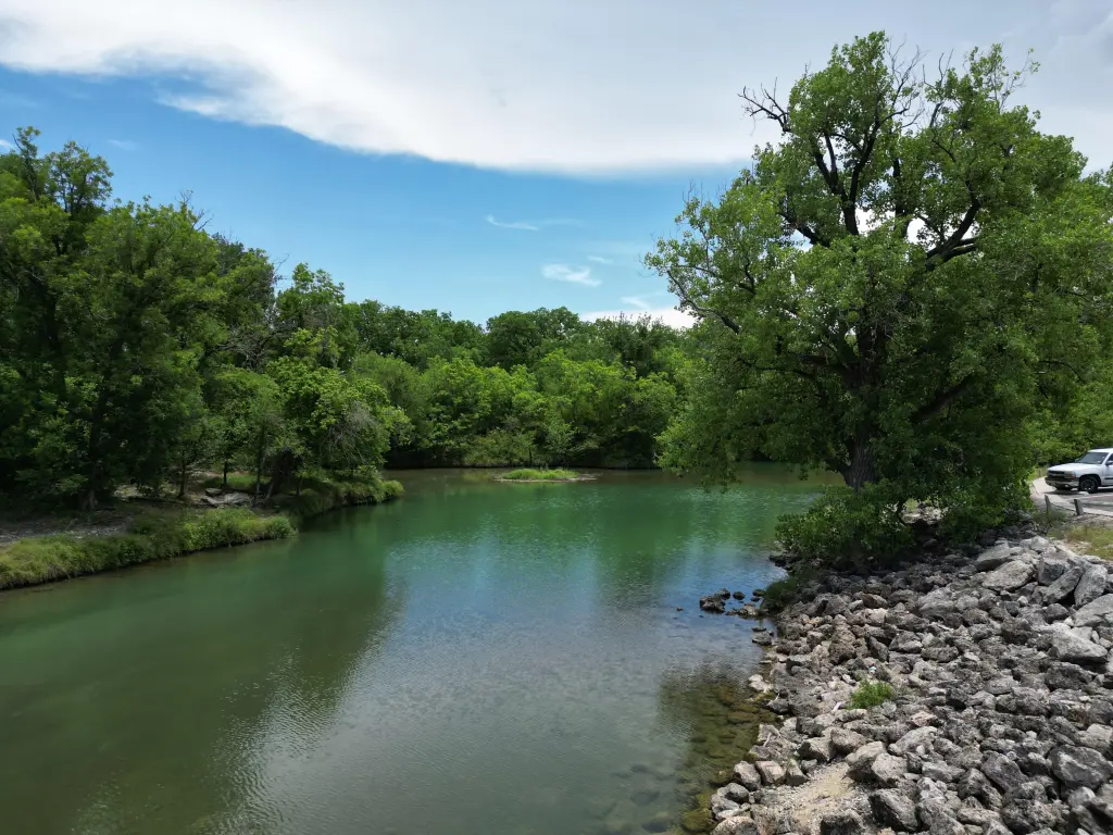 View of Leon River with trees lining its banks at the park