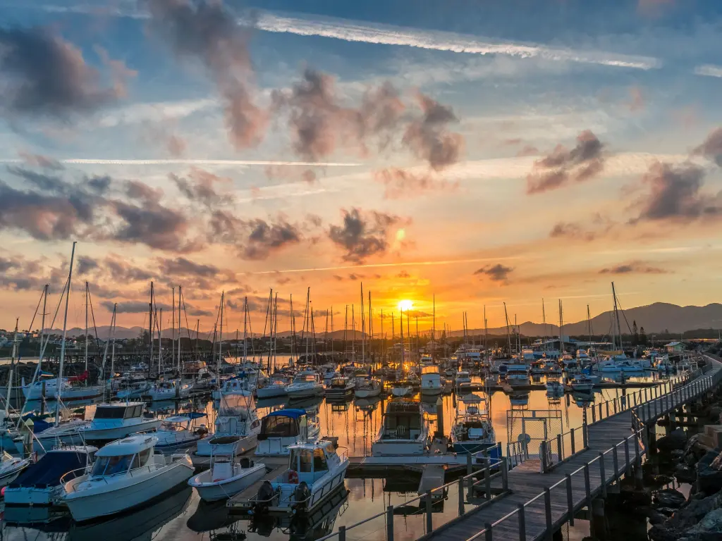 Beautiful sunset over boats in the harbour