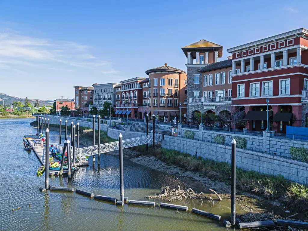 Riverfront in Downtown Napa, California, with colorful Venetian-style buildings on a sunny day
