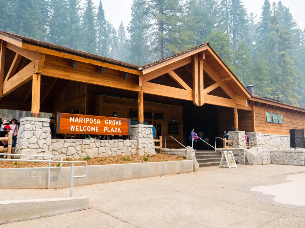 Wooden lodge-style building at the entrance to the new Mariposa Grove Welcome Plaza 